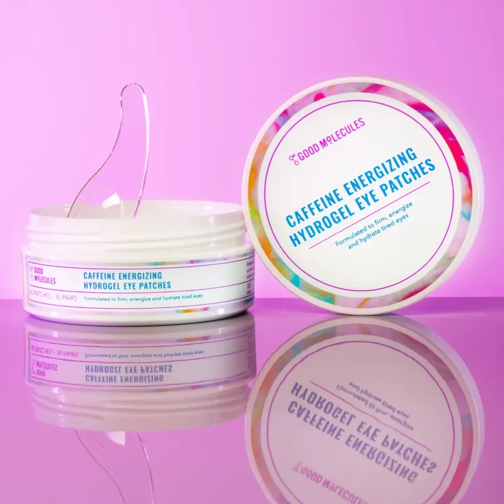 Two containers of the Good Molecules eye patches are on a purple backdrop.