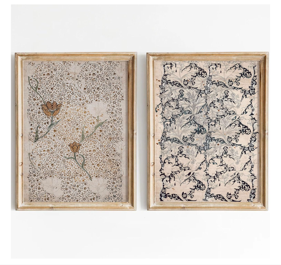 Two framed artworks featuring intricate floral patterns on a beige background.