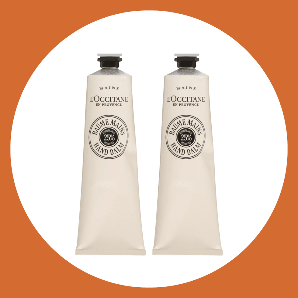Two L'Occitane hand balm tubes on a white and orange background.