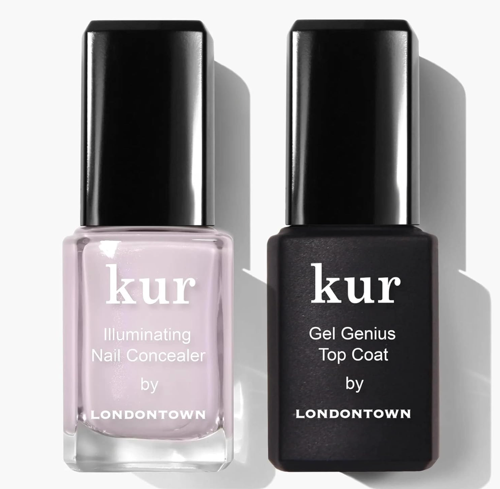 Two Londontown kur nail polish bottles with black caps.