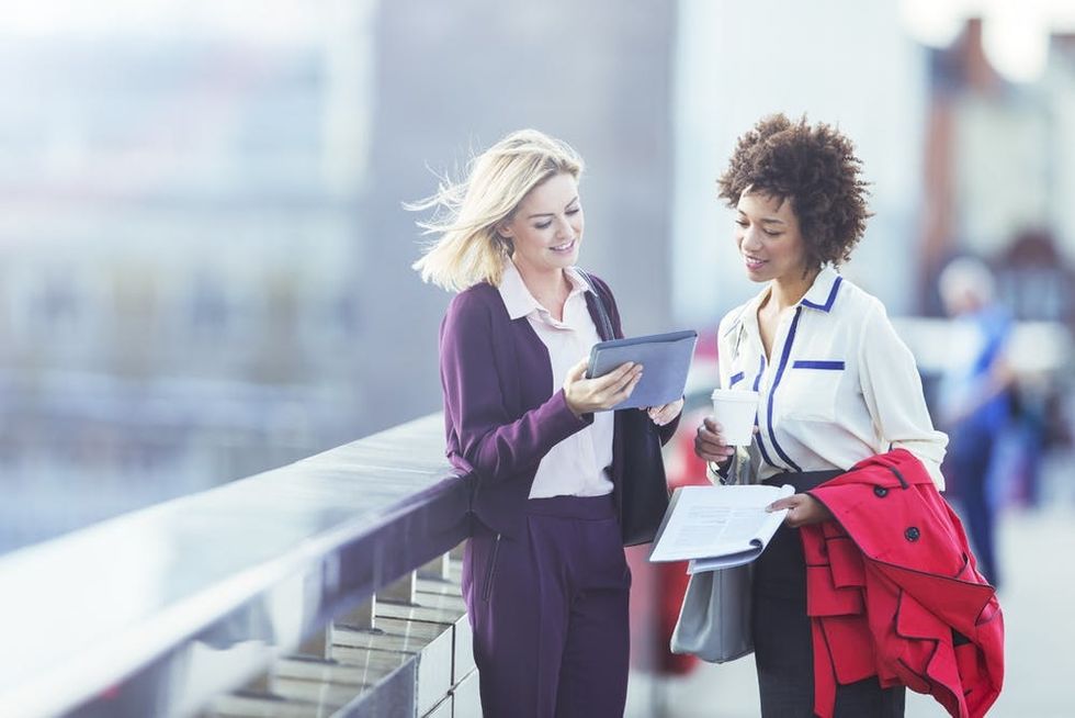 Two professionals have a discussion