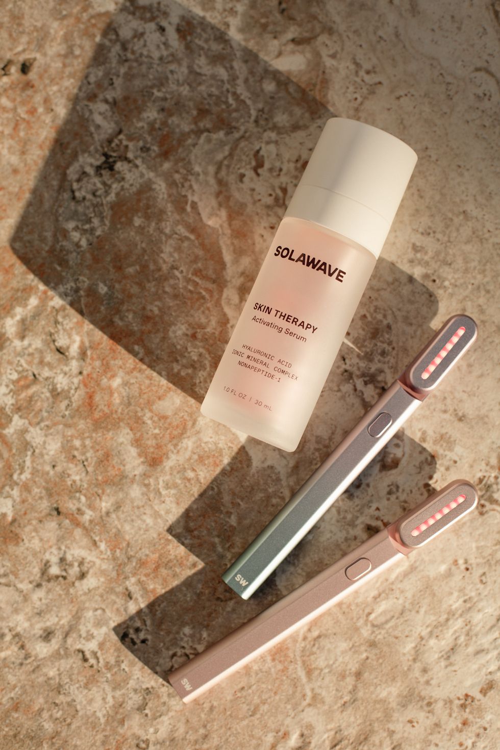 two solawave 4-in-1 skincare wands and the skin therapy activating serum