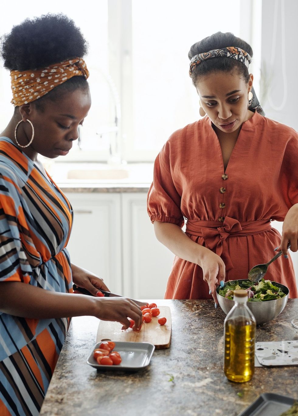 two women cooking together