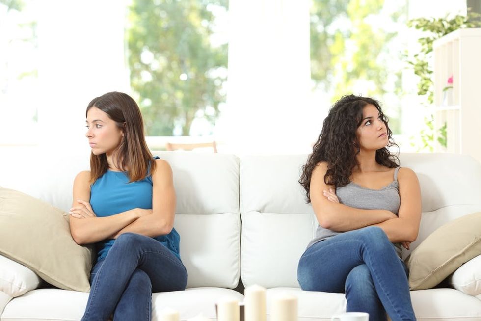 Two women friends arguing