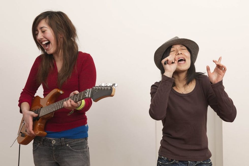 Two women make music together