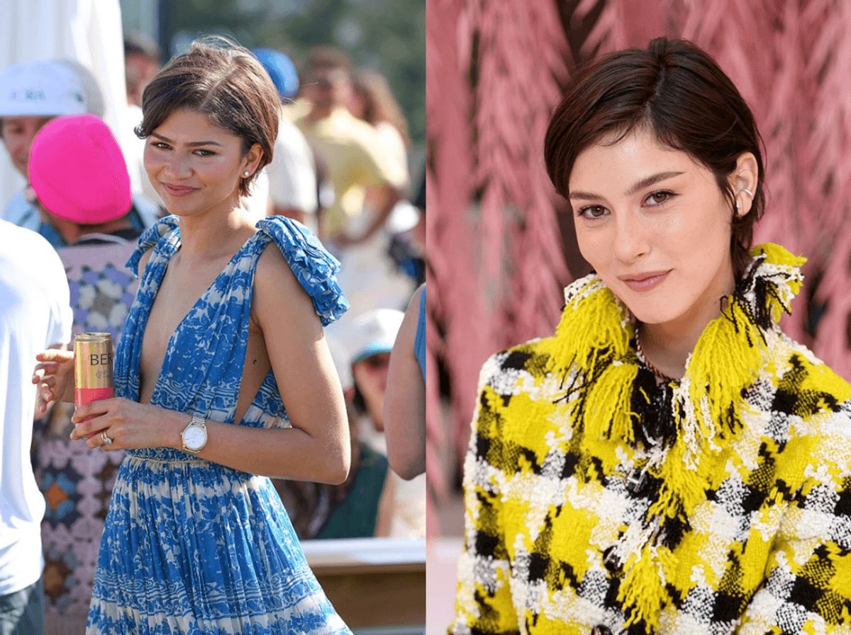 Two women posing stylishly, one in a blue dress, the other in a yellow plaid outfit.