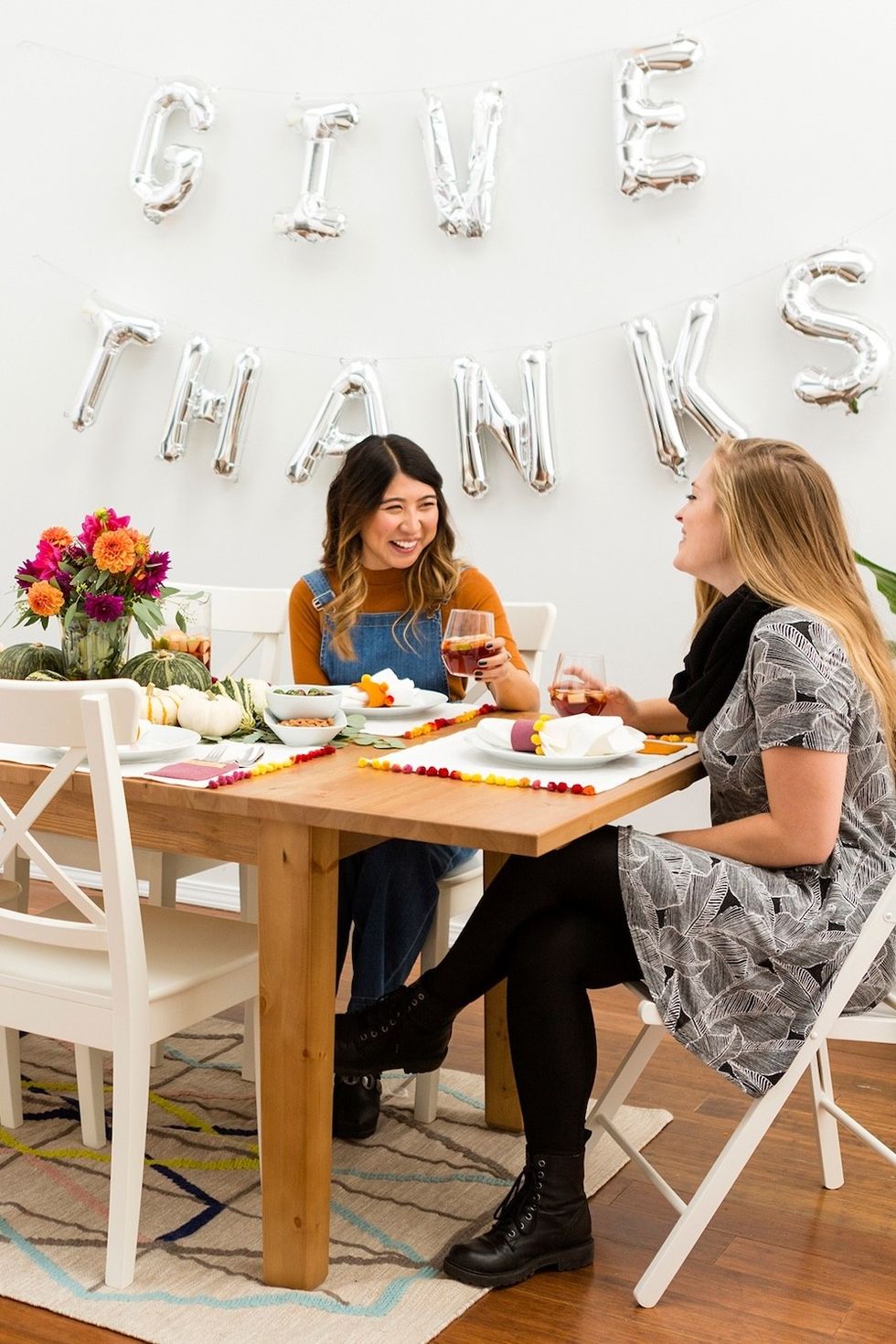 two women sitting at a table