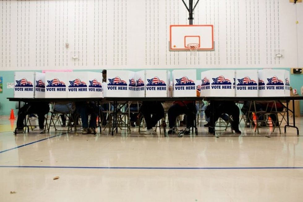 U.S. Citizens Head To The Polls To Vote In Presidential Election