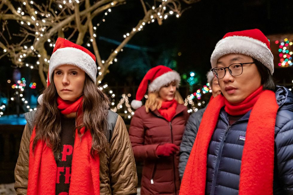 \u200bLove Hard. (L to R) Nina Dobrev as Natalie Bauer in Love Hard, and Jimmy O. Yang as Josh Lin.