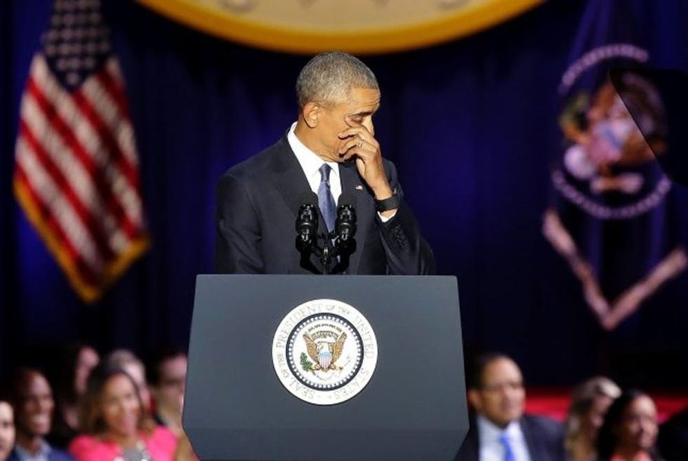 US President Barack Obama cries as he speaks during his farewell address in Chicago, Illinois on January 10, 2017. Barack Obama closes the book on his presidency, with a farewell speech in Chicago that will try to lift supporters shaken by Donald Trump's shock election. / AFP / Joshua LOTT (Photo credit should read JOSHUA LOTT/AFP/Getty Images)