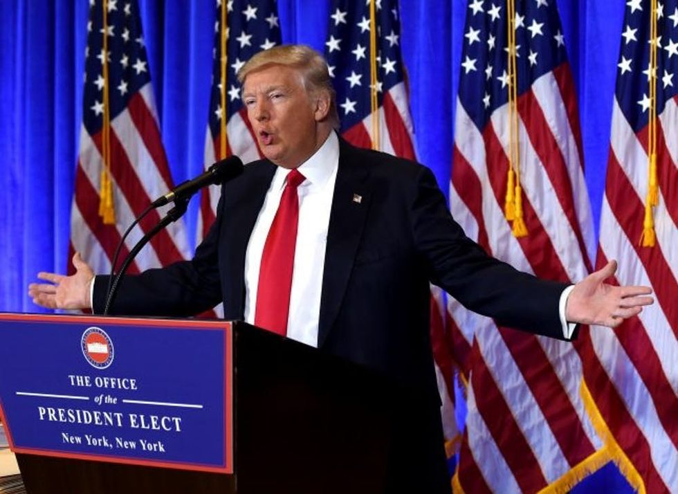 US President-elect Donald Trump speaks during a press conference January 11, 2017 at Trump Tower in New York. Trump held his first news conference in nearly six months Wednesday, amid explosive allegations over his ties to Russia, a little more than a week before his inauguration. / AFP / TIMOTHY A. CLARY (Photo credit should read TIMOTHY A. CLARY/AFP/Getty Images)