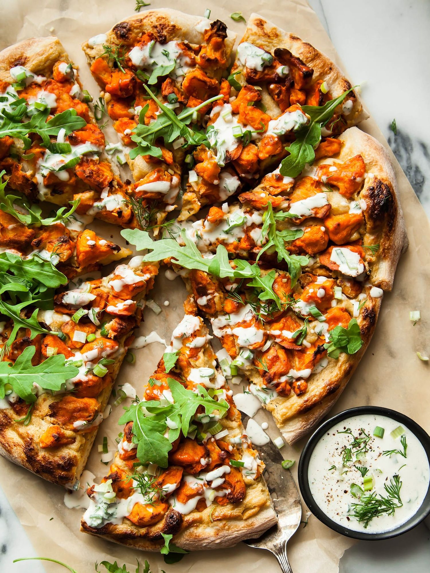 Vegan Buffalo Cauliflower Pizza with Roasted Onion Cream