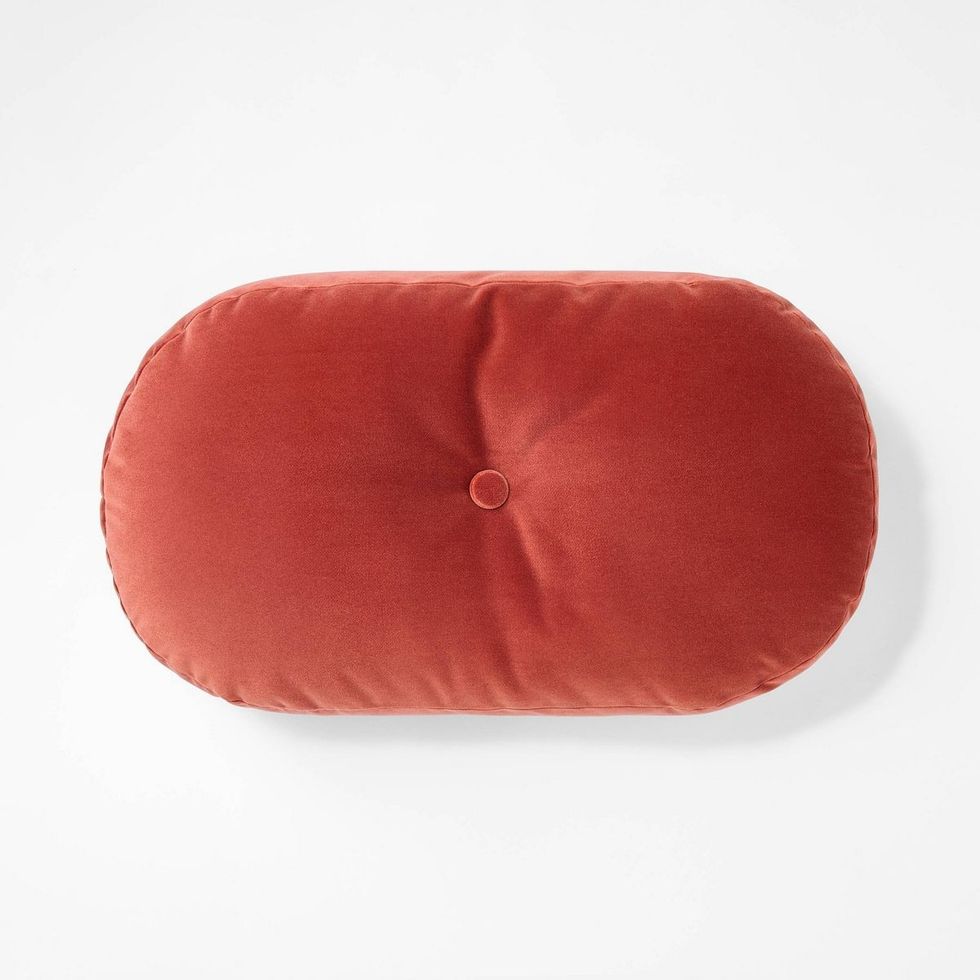 Velvet Oval Shaped Throw Pillow with Tufted Center