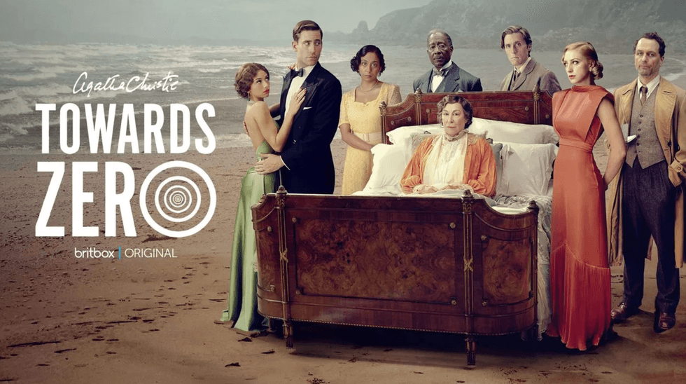Victorian-era group poses on a beach with a woman in a bed, promoting "Towards Zero."
