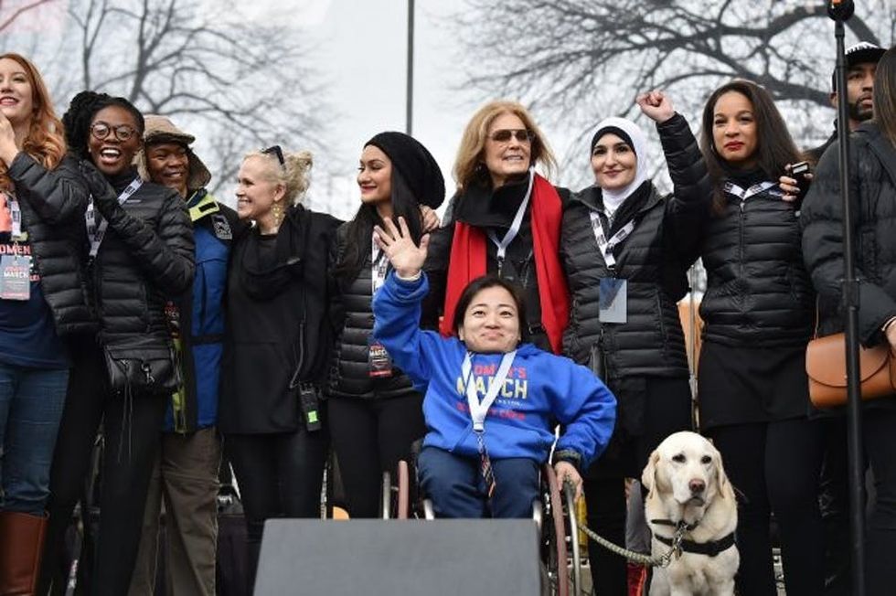 WASHINGTON, DC - JANUARY 21: (L-R back row) Bob Bland, Nantasha Williams, Jamiah Adams, Ginny Suss, Carmen Perez, Gloria Steinem, Linda Sarsour, Janaye Ingram and (front row) Mia Ives-Rublee (Photo by Theo Wargo/Getty Images)