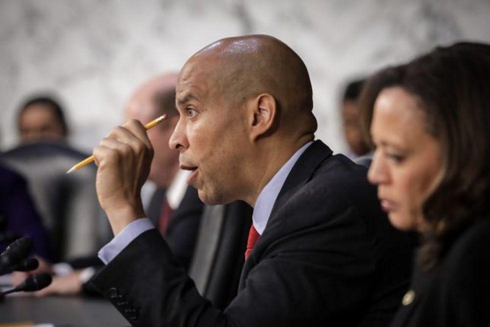 WASHINGTON, DC - SEPTEMBER 6: Sen. Cory Booker (D-NJ) questions Supreme Court nominee Judge Brett Kavanaugh before the Senate Judiciary Committee on the third day of his Supreme Court confirmation hearing on Capitol Hill September 6, 2018 in Washington, DC. Kavanaugh was nominated by President Donald Trump to fill the vacancy on the court left by retiring Associate Justice Anthony Kennedy. (Photo by Drew Angerer/Getty Images)