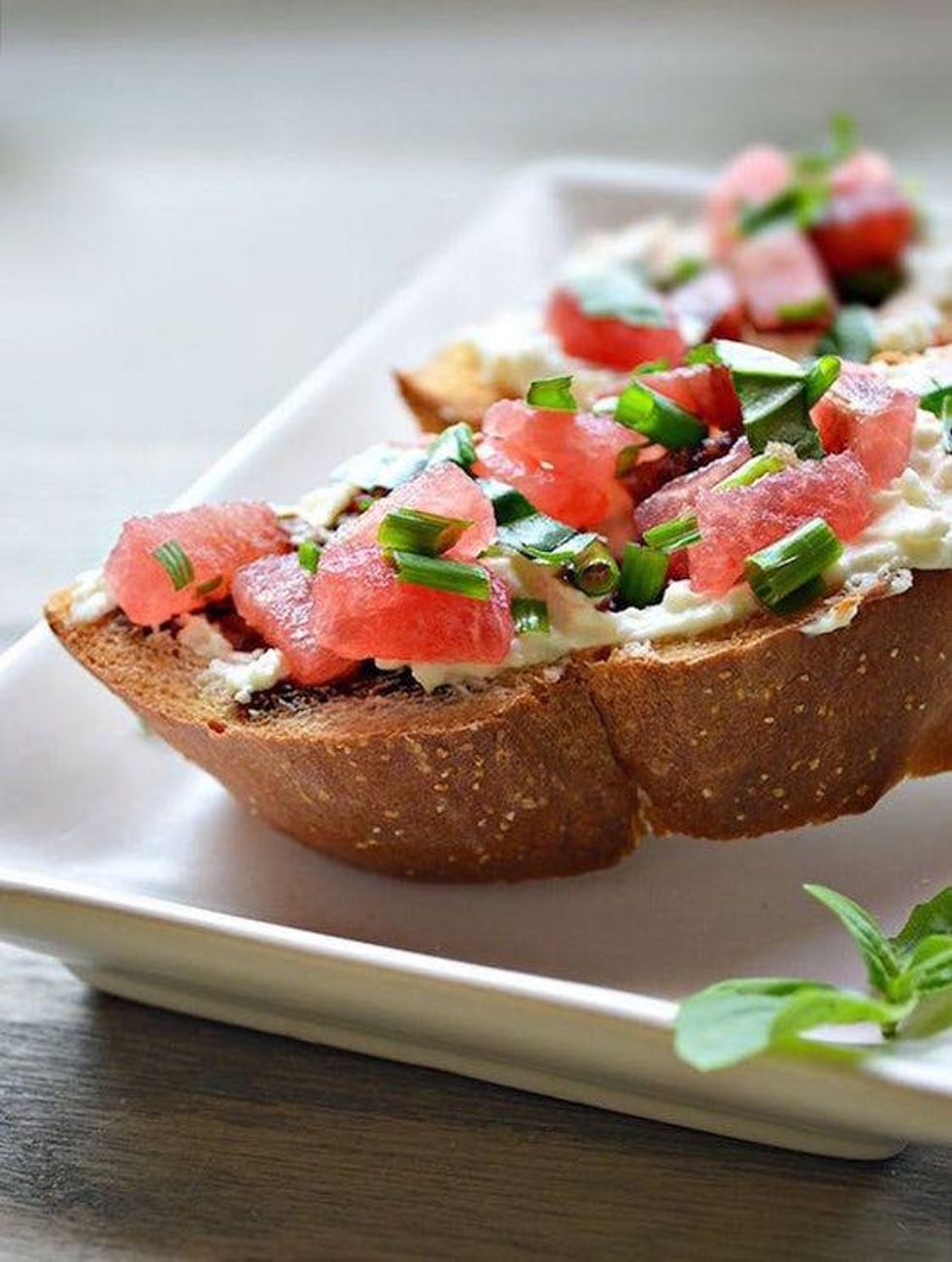 watermelon crostini on a white plate