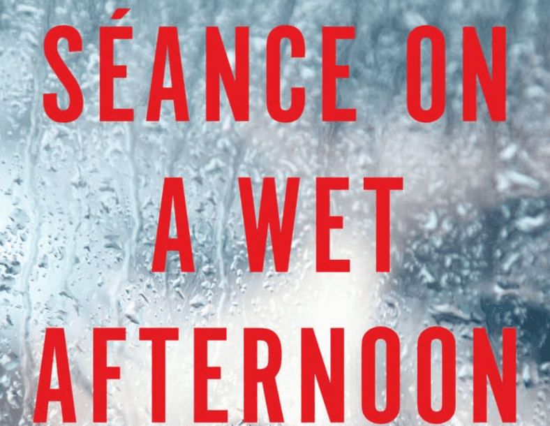 Wet glass with red text: "S\u00e9ance on a Wet Afternoon" by Mark McShane.