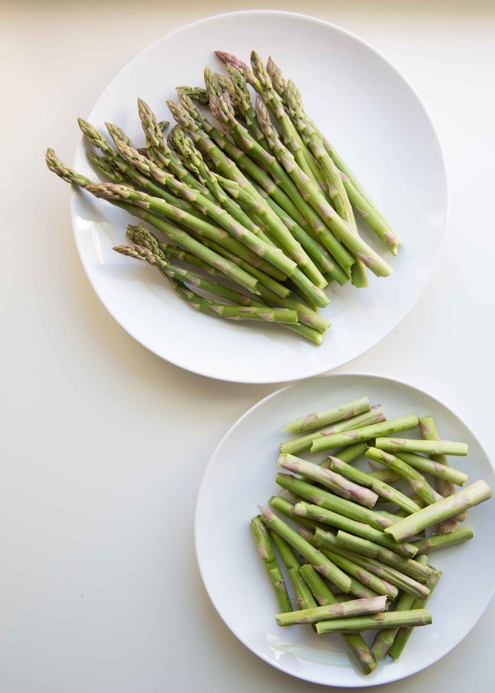 When eating asparagus, snap off the woody ends. You can use them once softened as an ingredient for asparagus soup.