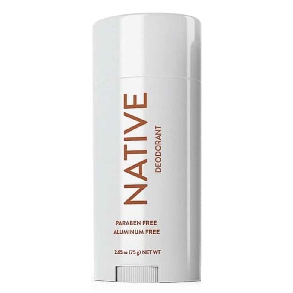 white bottle of native paraben free with brown writing