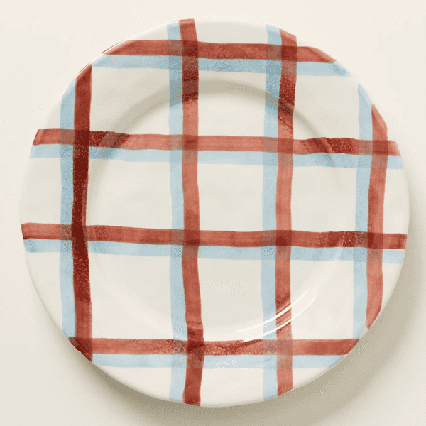 White plate with red and blue plaid pattern.
