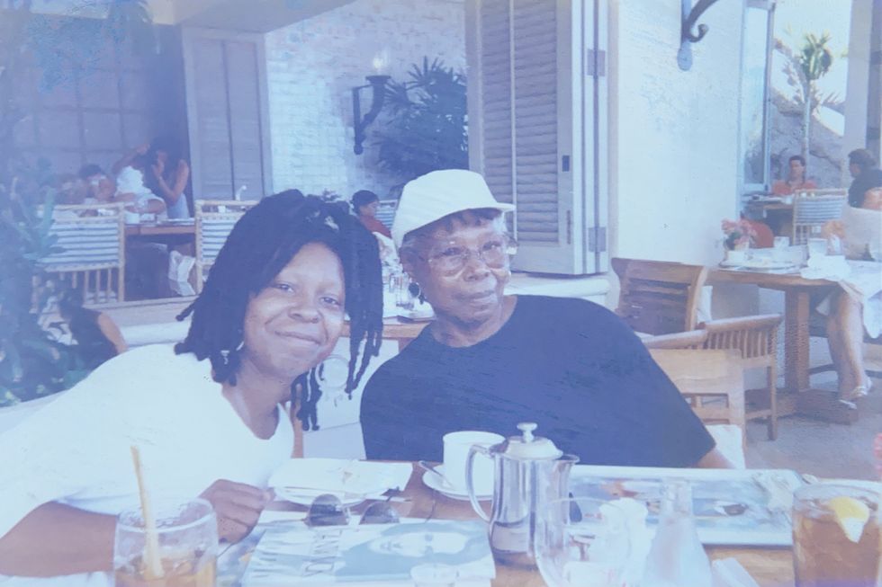 whoopi goldberg seated next to her mother Emma Johnson