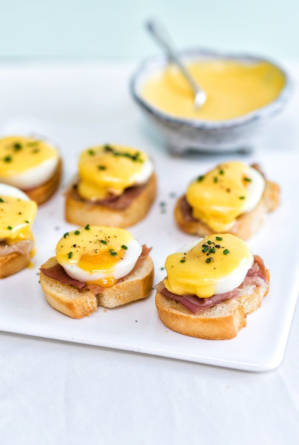 Why is with bite-sized food? Little nibbles, mini mouthfuls or amuse bouche - call them what you like, they taste twice as nice when shrunk down to adorable proportions. Make these super-cute mini Eggs Benedict to wow at your next party! 