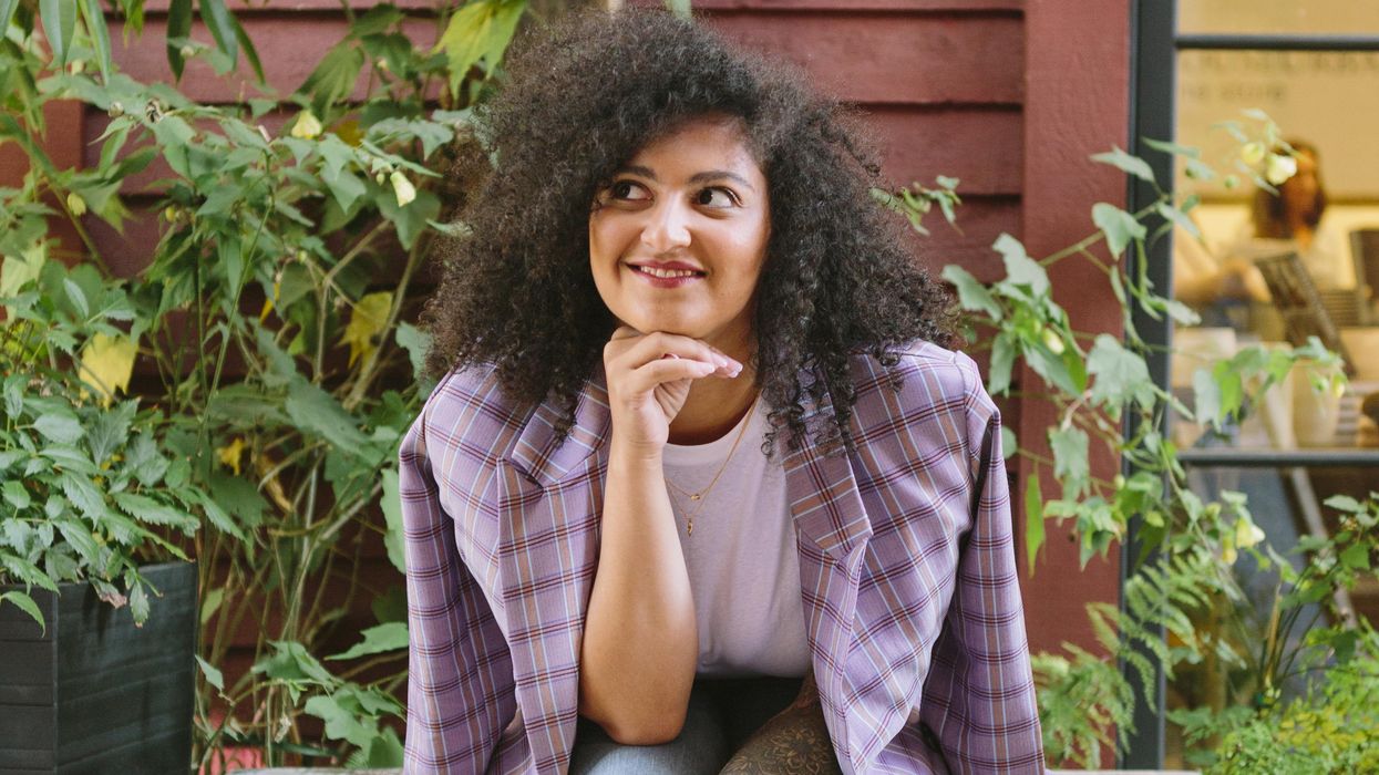 winter staycation ideas girl in a purple blazer