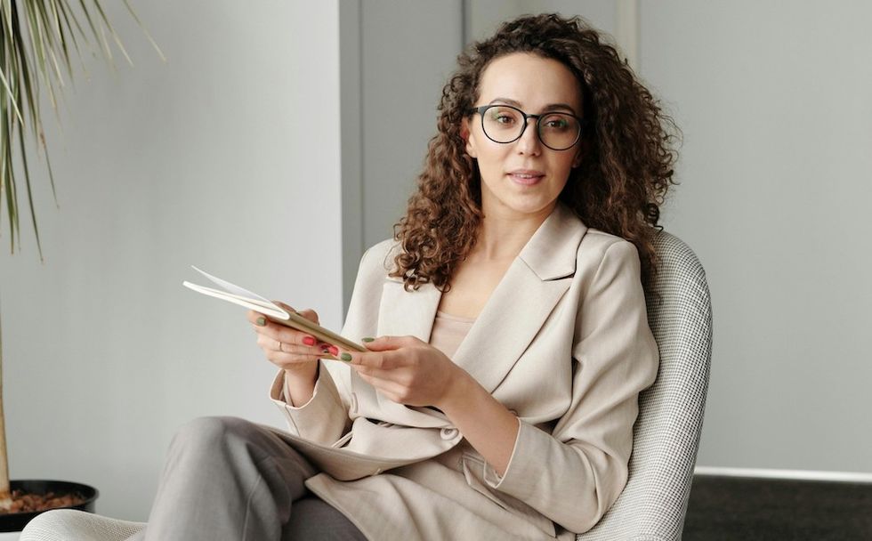 woman asking for feedback at work