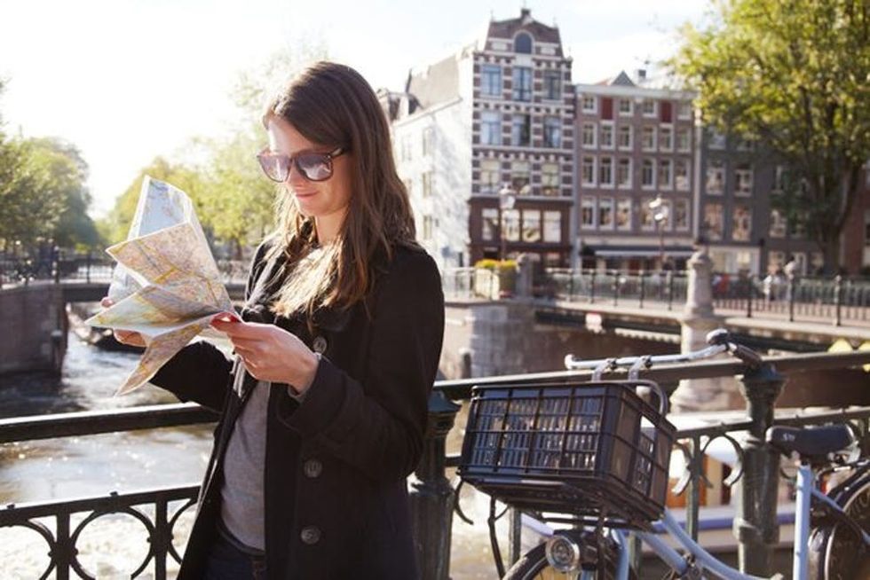 woman-canal-amsterdam