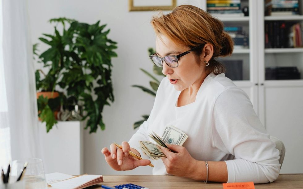 woman counting money