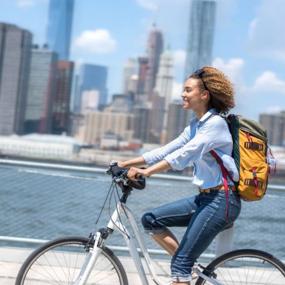 Woman cycling in the city