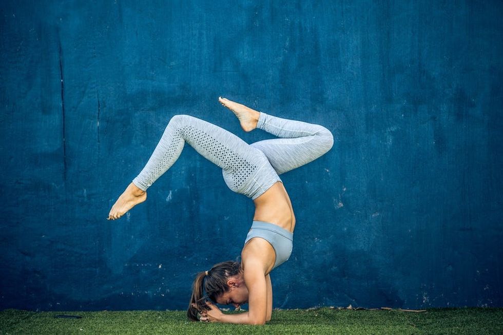 Woman Doing Inverted Yoga