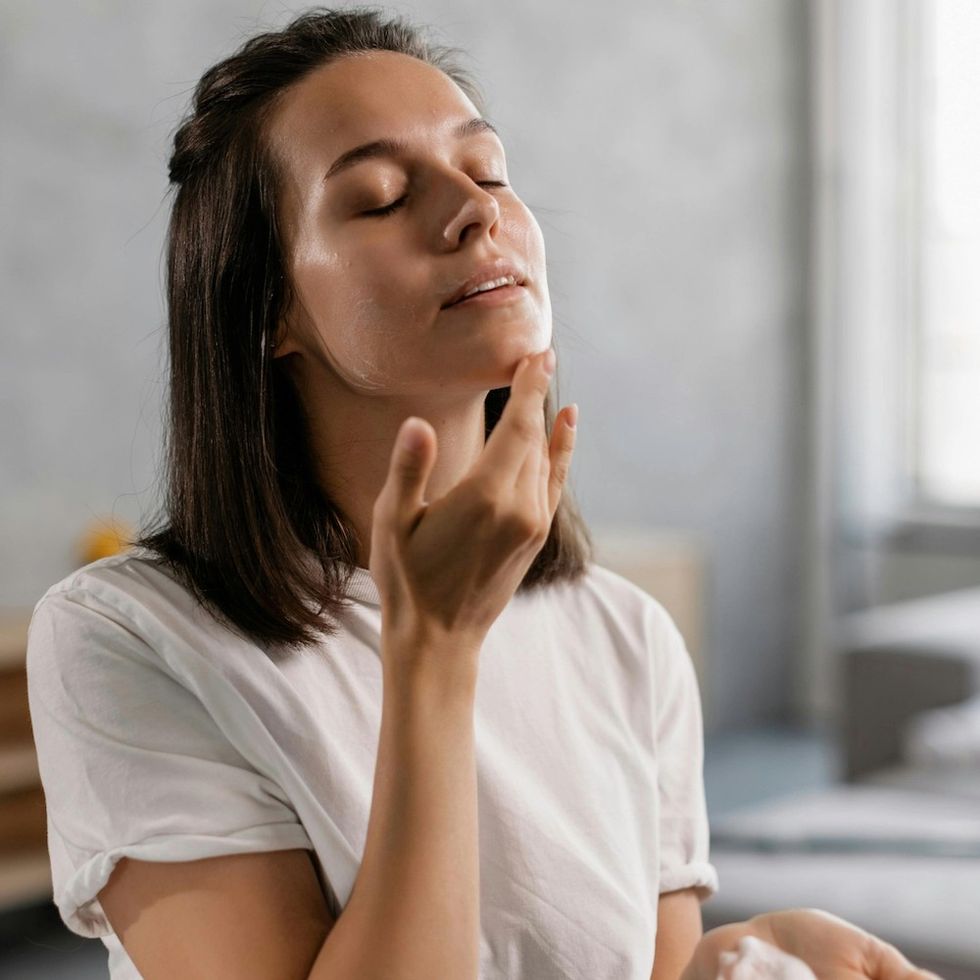 woman doing skincare routine