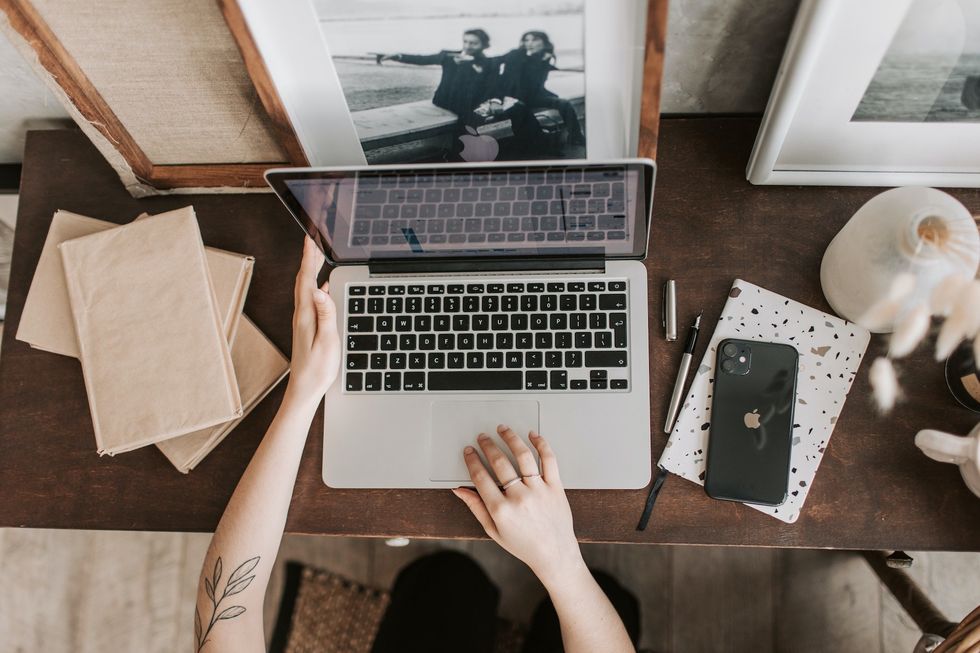 woman focusing on laptop
