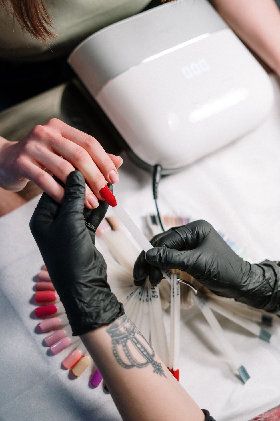 Woman getting a gel manicure