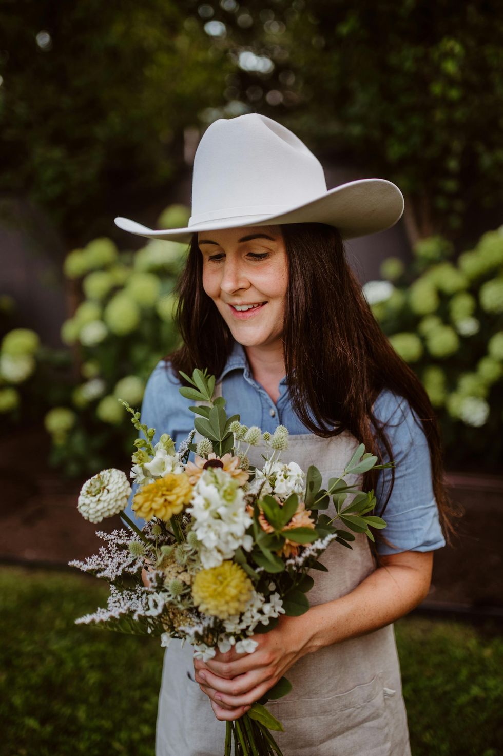 woman holding wildflowers