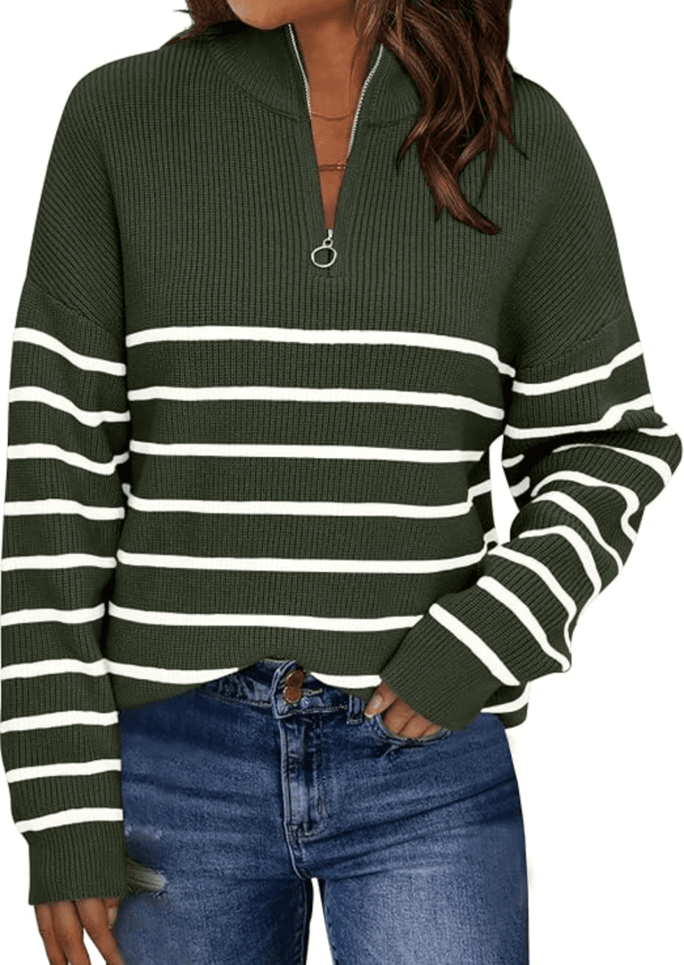Woman in a green striped sweater with a half-zip, paired with blue jeans.