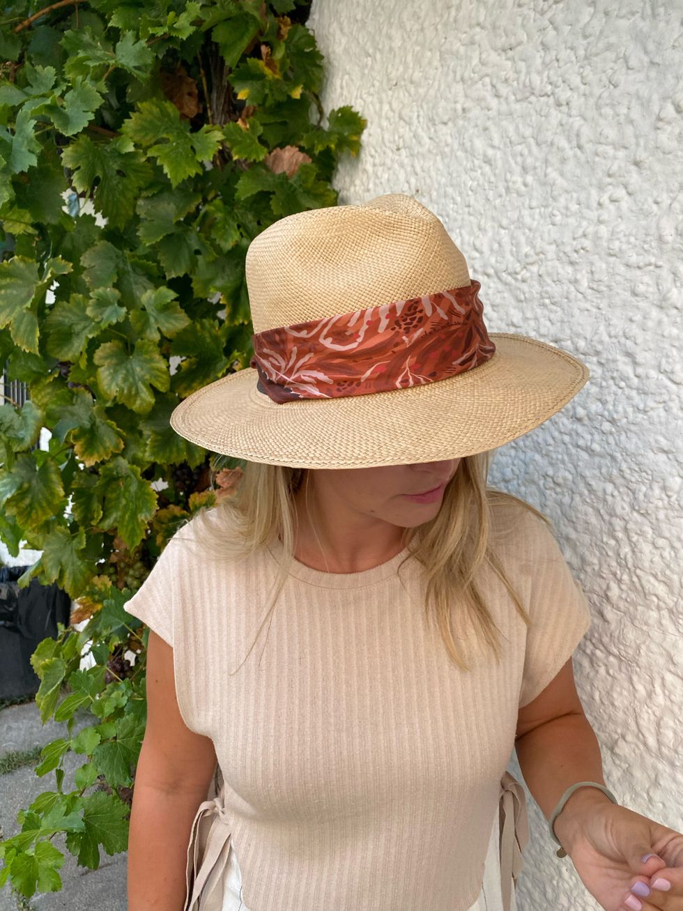 woman in a wide-brimmed hat