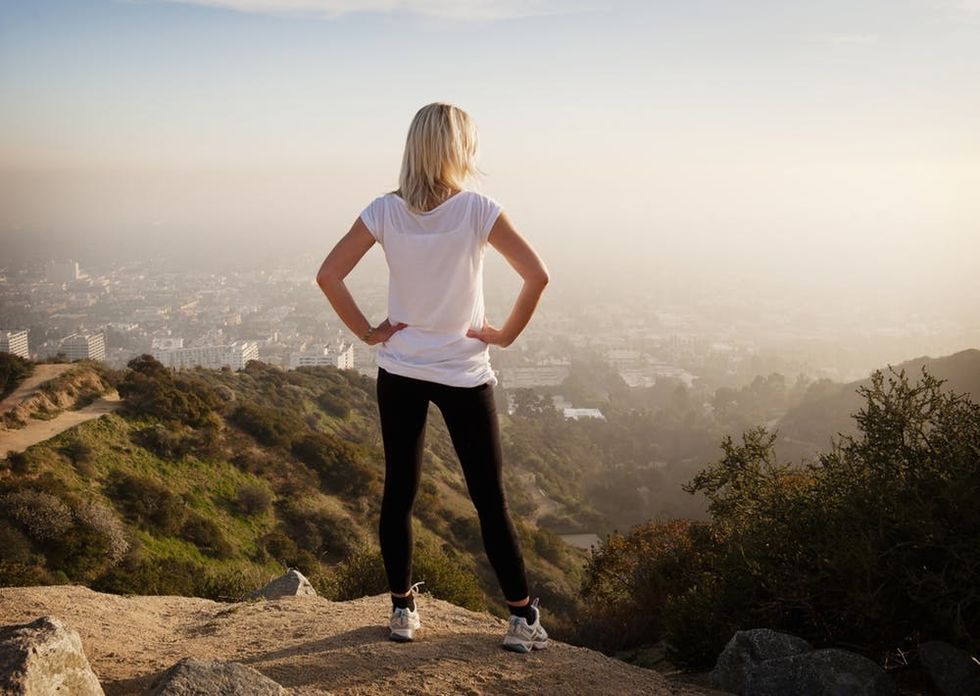 Woman looking at smoggy view