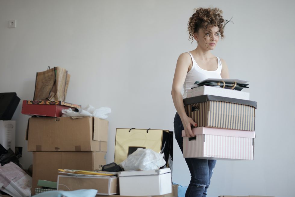woman moving into apartment