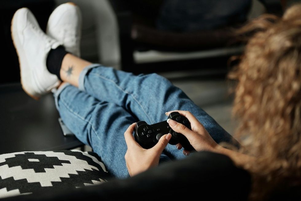 woman playing a video game