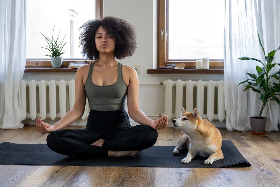 woman practicing yoga for focus