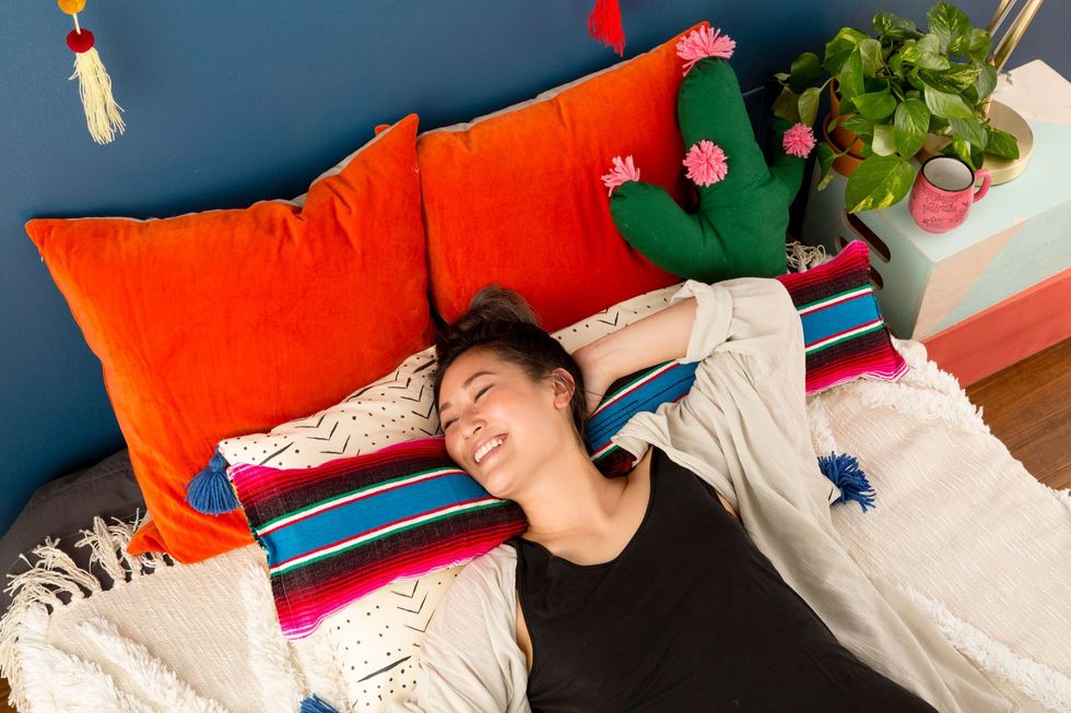 woman relaxing in bed