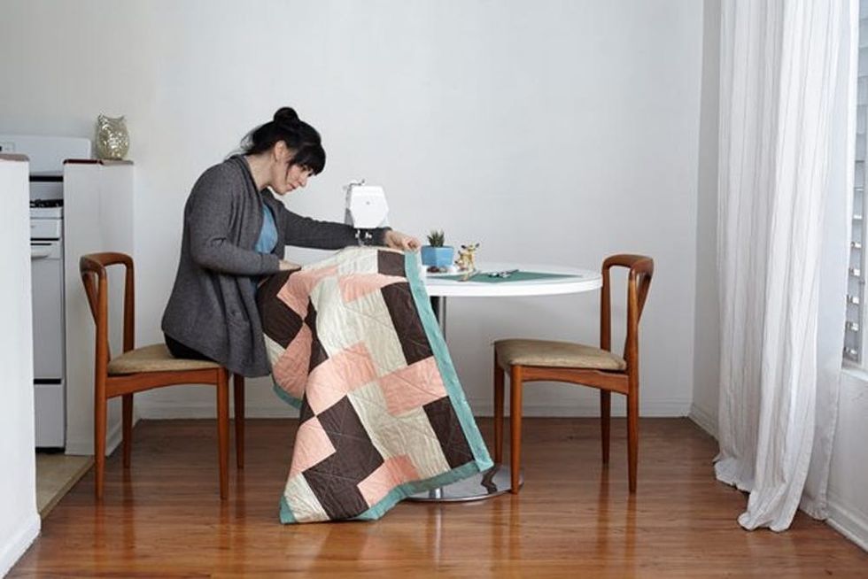 woman-sew-quilt