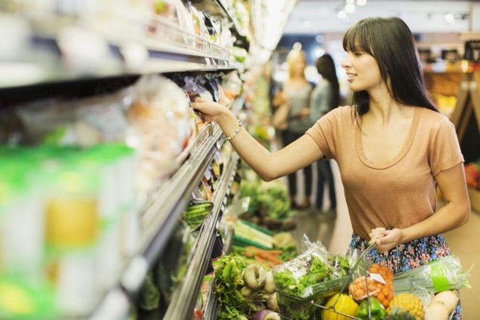 Woman shopping in grocery store