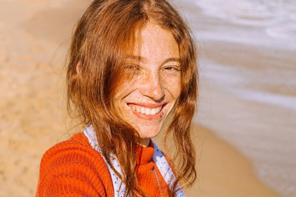 woman smiling on the beach