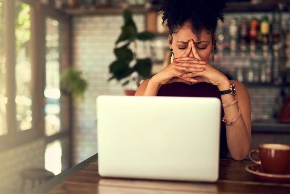 woman stressed out at laptop