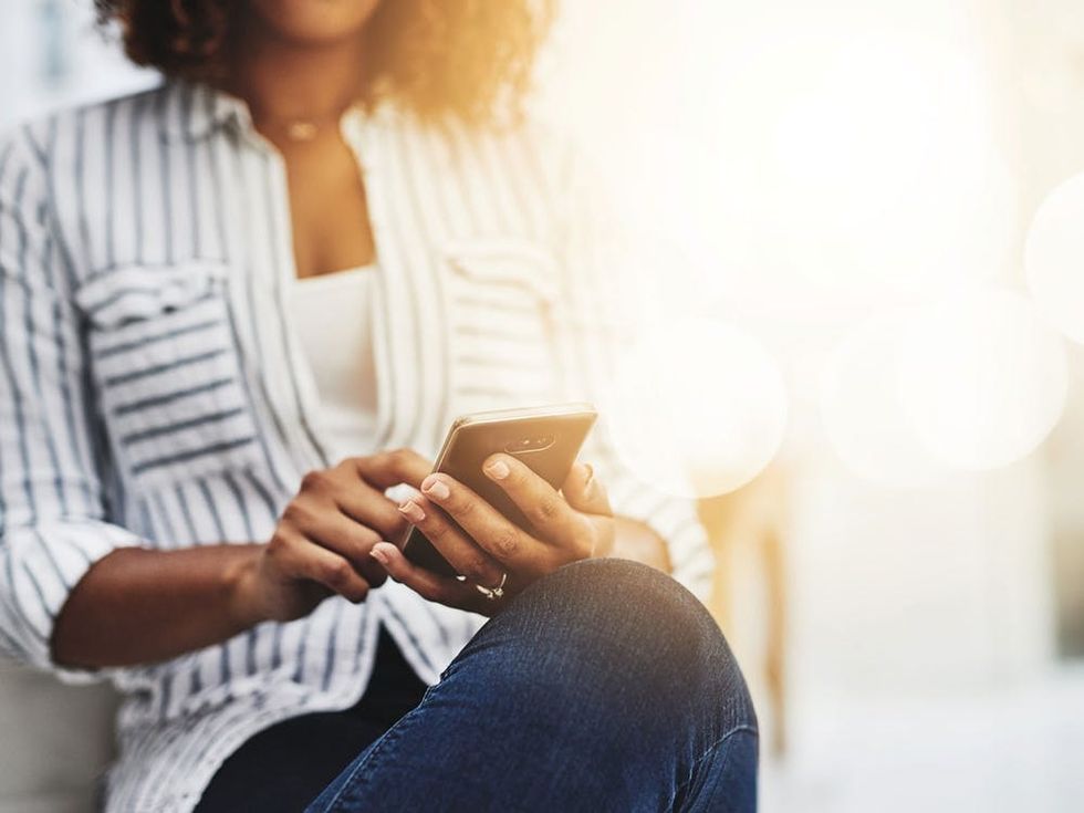 Woman swiping on smartphone