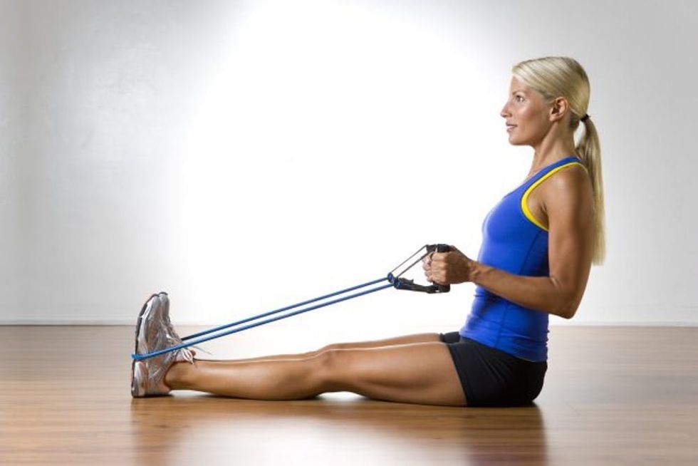 Woman Using Exercise Band